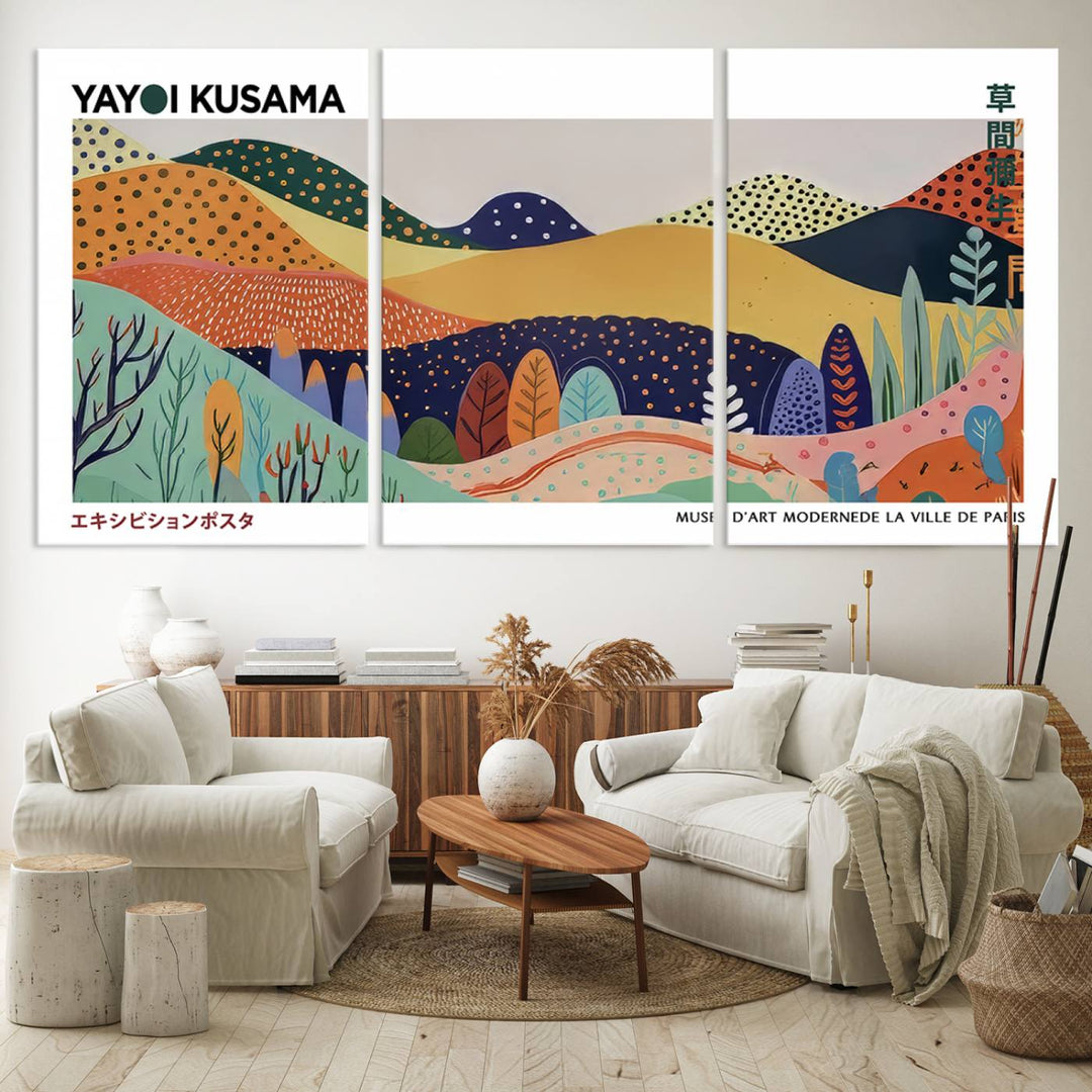 A triptych featuring the Framed Yayoi Kusama 1986 Wall Art Print hangs above. This Japanese Wabi Sabi inspired piece, rich in vibrant abstract landscapes, adds an elegant touch to any nature-inspired décor.