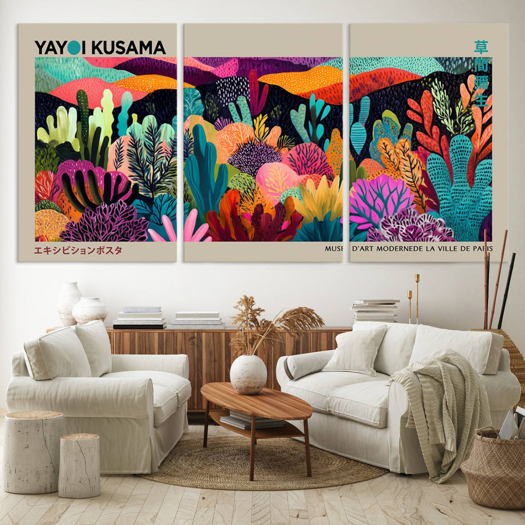 The framed Yayoi Kusama wall art adds vibrancy above the blue couch.