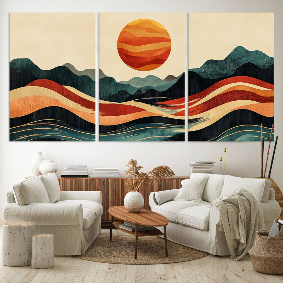 The Mountain Triptych wall art, featuring a design of the sun, mountains, and waves, is displayed prominently on the wall.