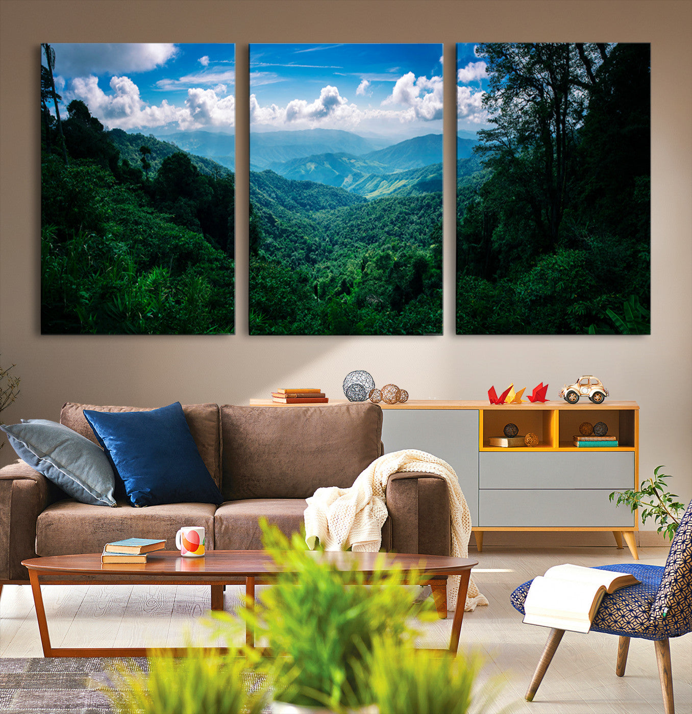 Canvas of a misty tropical jungle with vibrant greenery and layered blue mountains, ideal for exotic nature-themed wall décor.