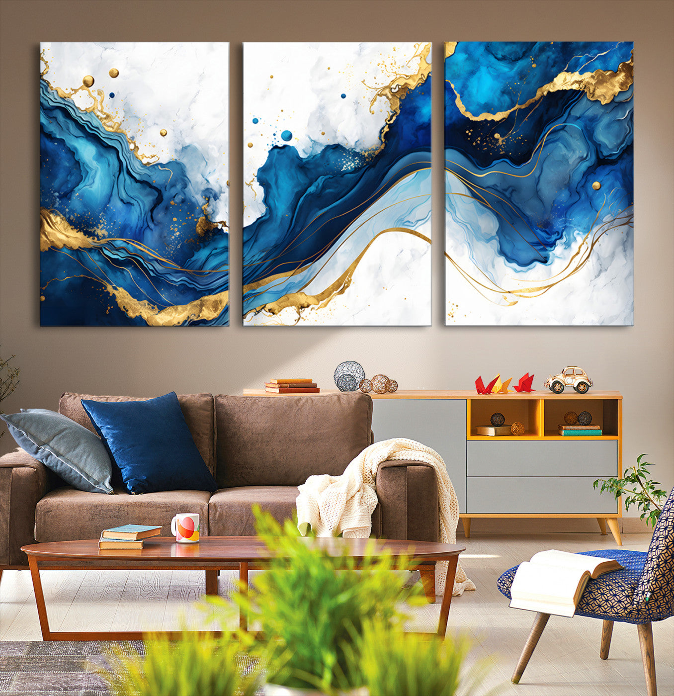 Elegant abstract canvas in cobalt blue and gold tones, featuring marble waves and fluid motion, ideal for luxe interior styling.