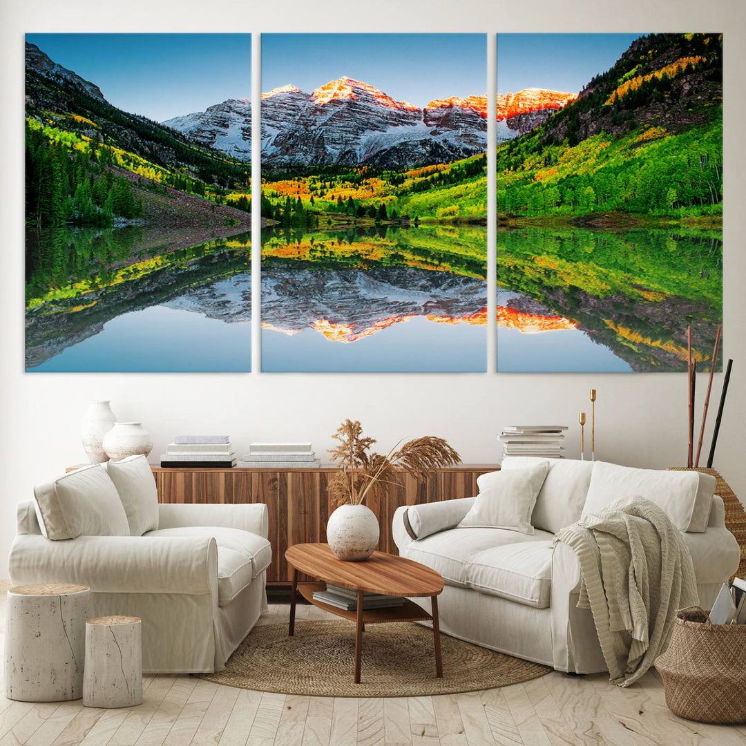 The Sunrise Maroon Bells Lake Wall Art Print beautifully captures North Maroon Peak mirrored in the tranquil lake, framed by lush greenery.