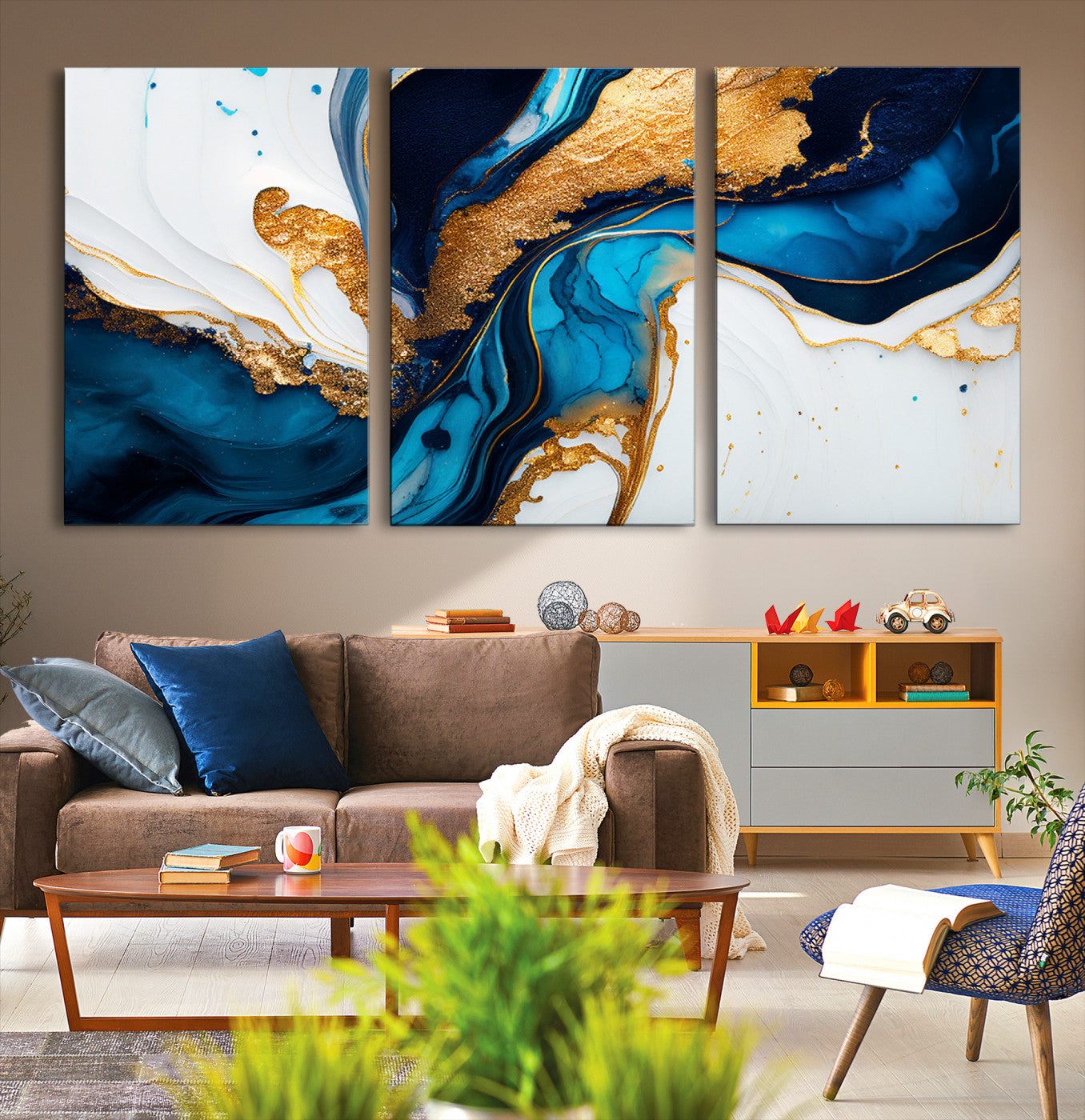 Luxurious abstract canvas in gold, navy, and teal tones with fluid marble patterns, perfect for modern glam or upscale interiors.