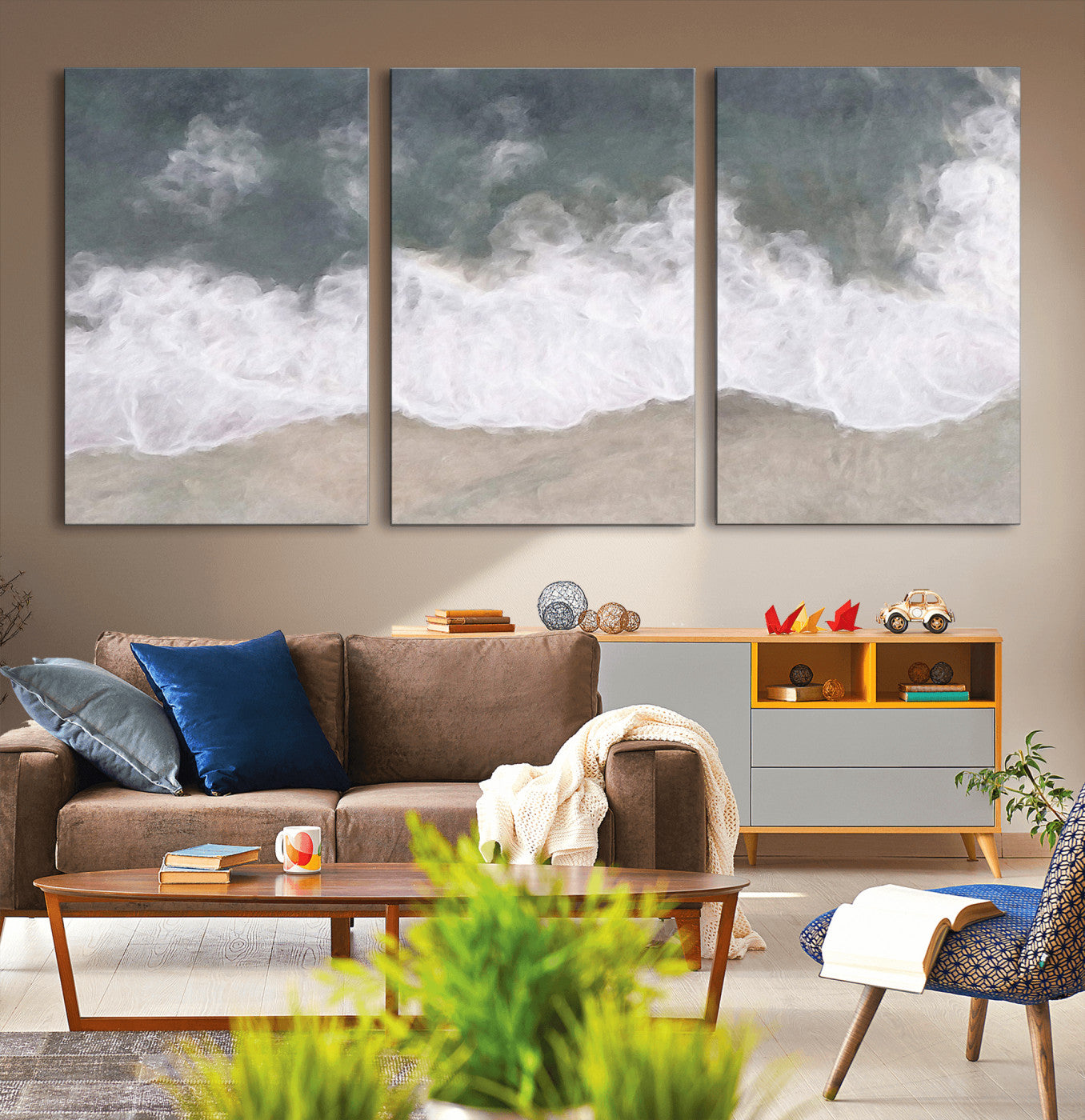 Wall art canvas print featuring foamy ocean waves softly rolling onto a sandy shore with a dreamy, painterly texture.