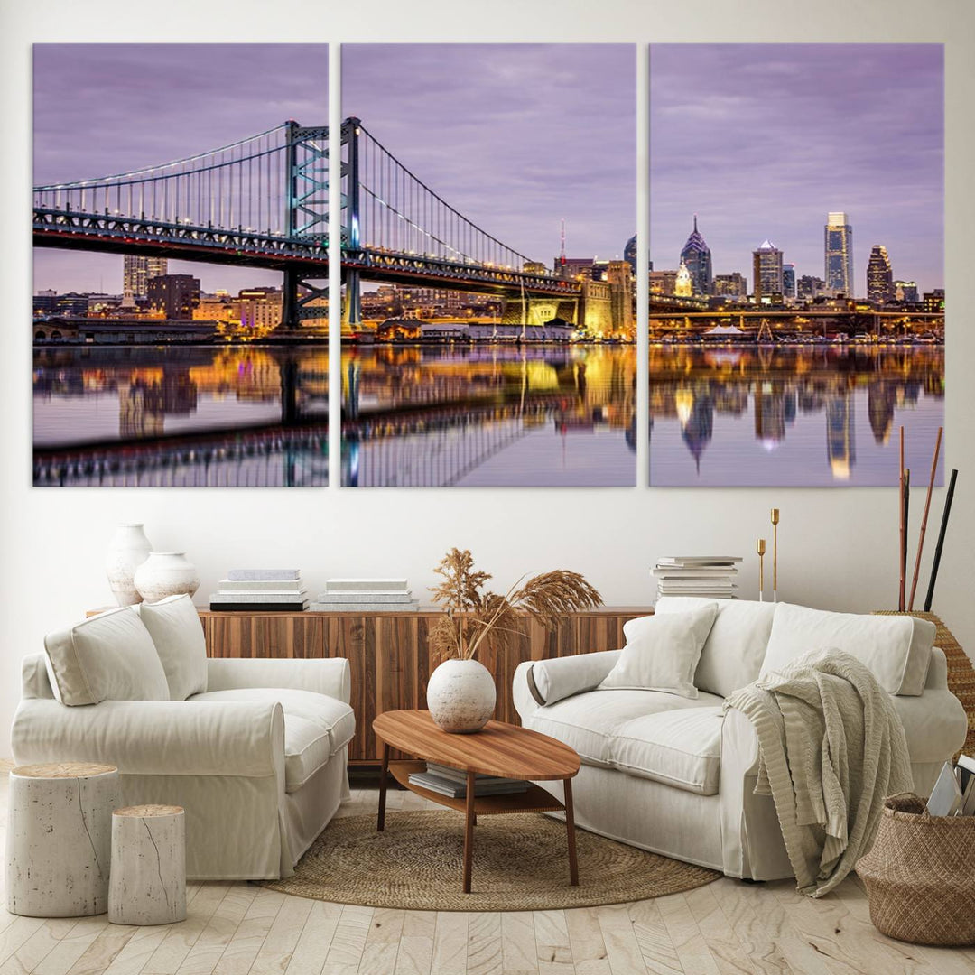 A woman holds the Philadelphia Ben Franklin Bridge Wall Art Canvas Print, a gallery-quality photo showcasing a city skyline with the bridge reflecting on the river. This stunning piece would make an excellent addition as premium canvas wall art for any home.