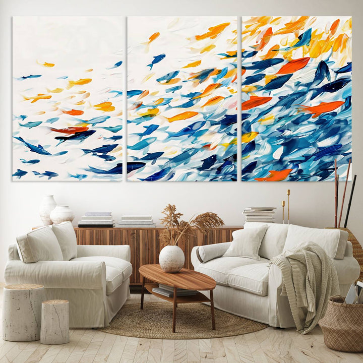 A colorful Abstract Fish Shoal Canvas Print hangs on the wall.