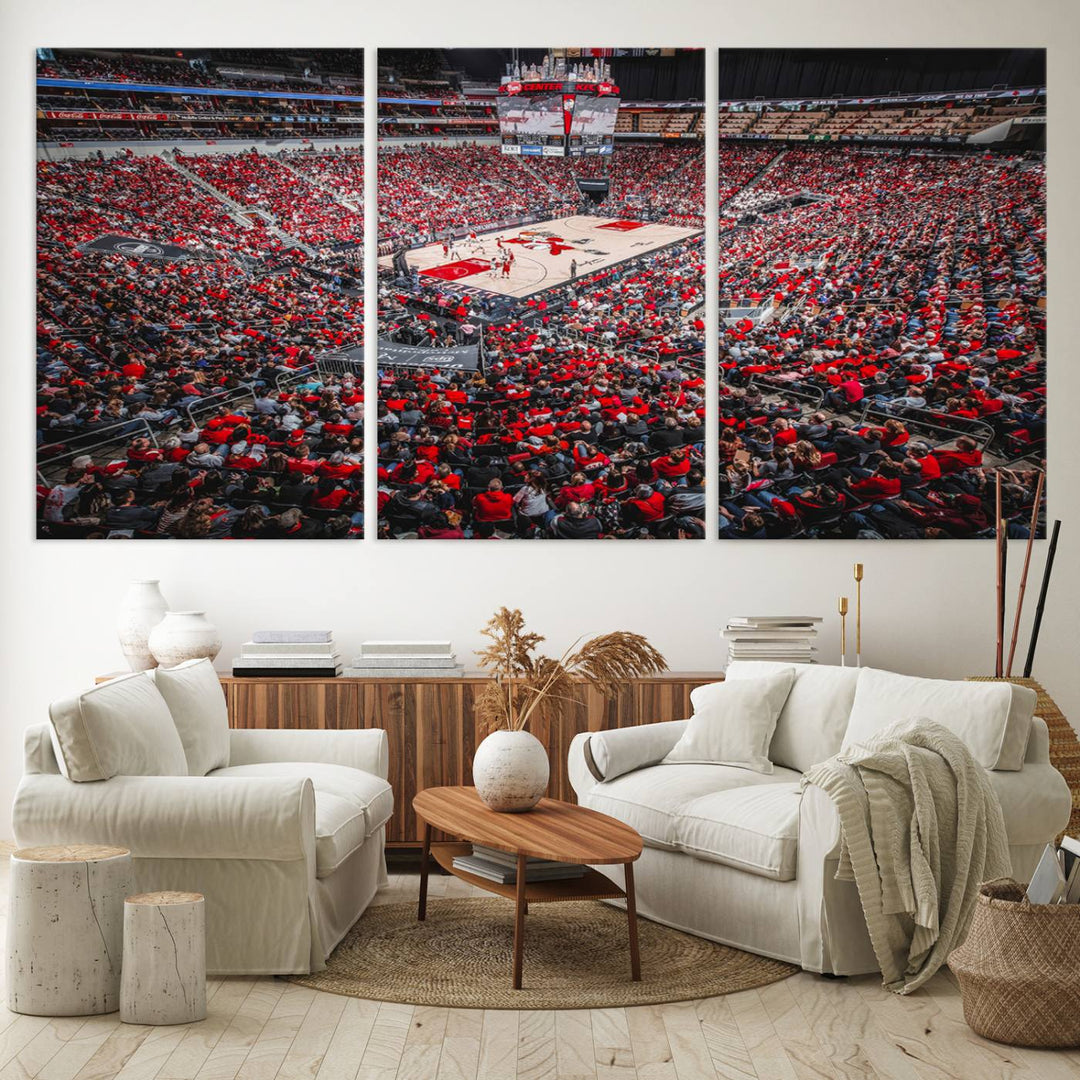 A painting of Louisville Cardinals fans in red at the KFC Yum Center Arena.