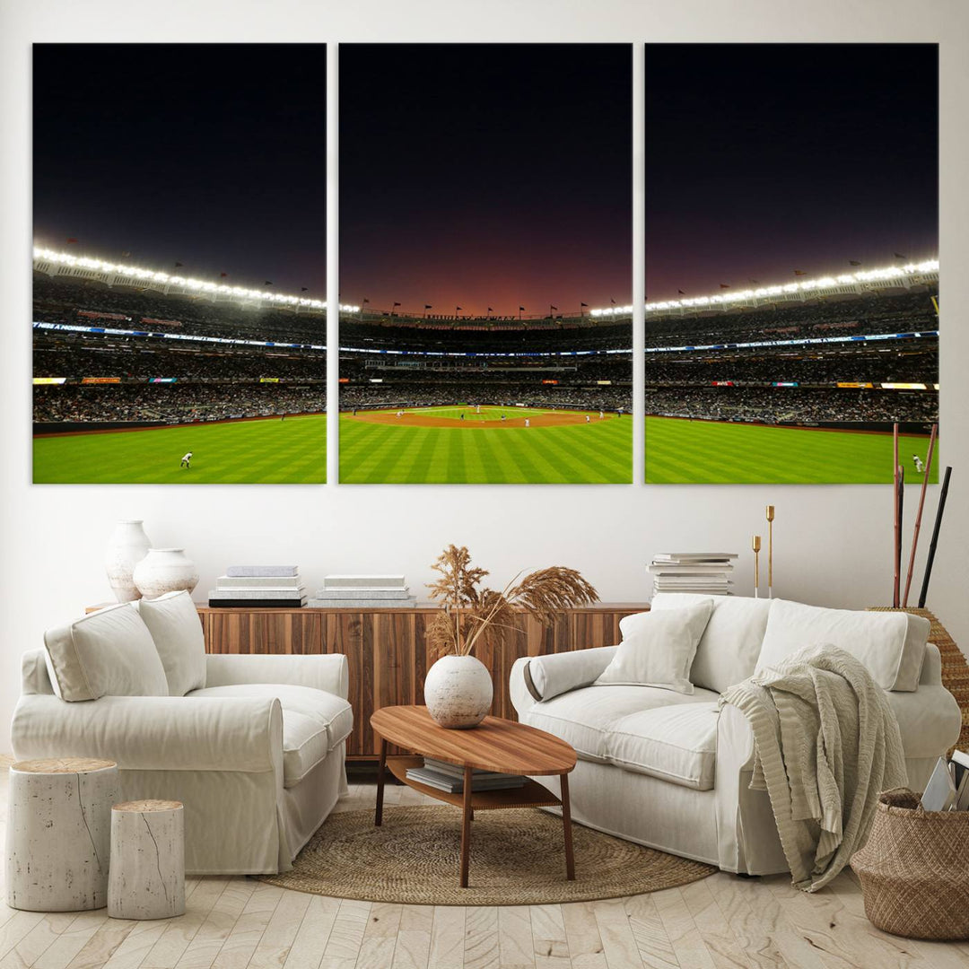 A night game at Yankee Stadium depicted on canvas beneath a sunset sky.