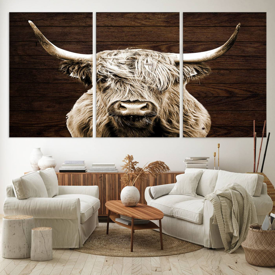 Highland Cow Wall Art Canvas Print: Majestic Scottish bull on rustic decor, ready to hang.