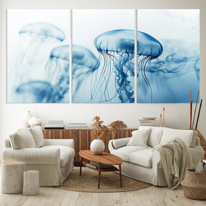 A breathtaking triptych of the Blue Jellyfish Wall Art Canvas Print decorates the space, beautifully highlighted by an overhead lamp. Each canvas is created on museum-quality material using high-resolution printing and includes a UV-protective coating to ensure long-lasting vibrancy.