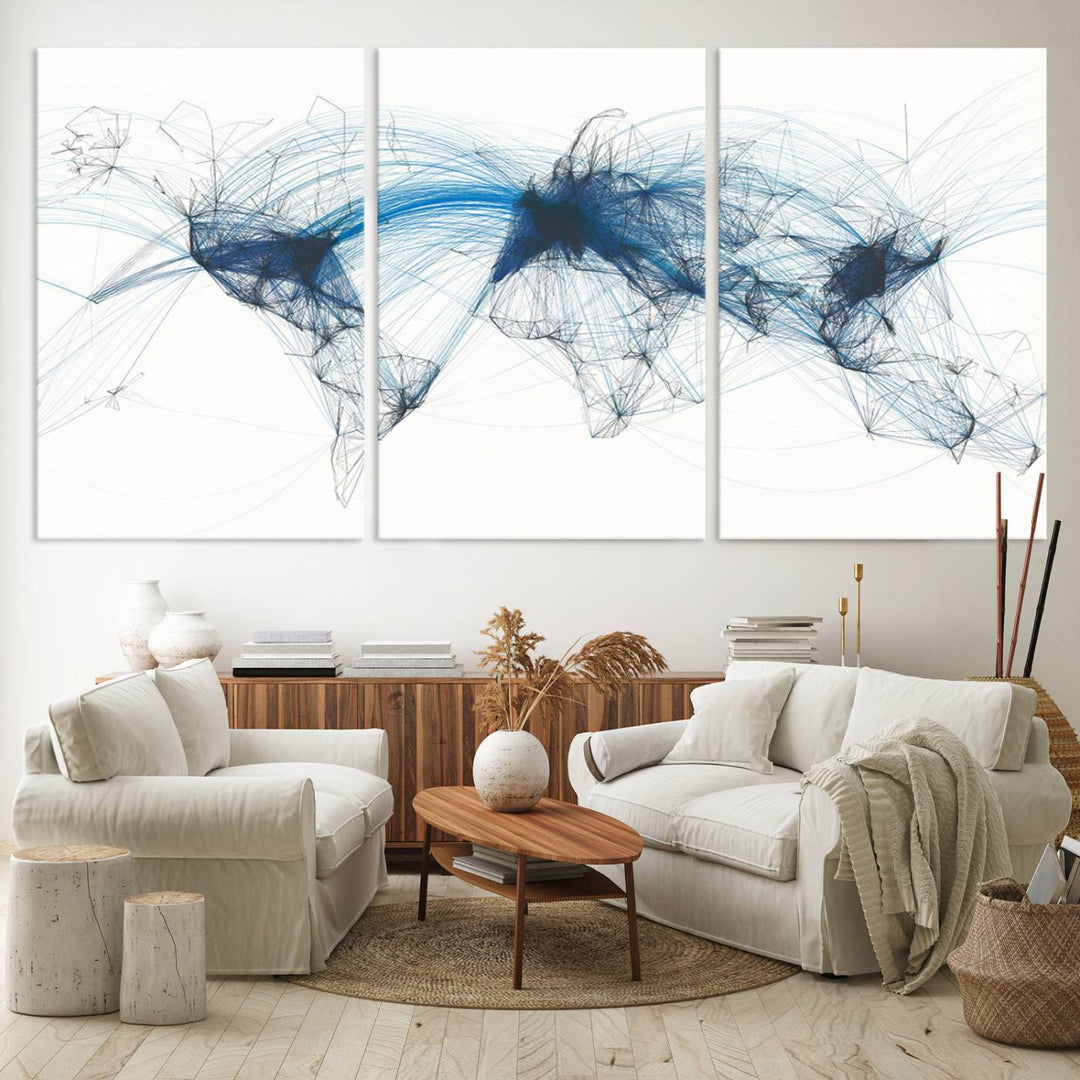 The Aviation Flight Map Wall Art is a set of three abstract panels featuring a world map with blue lines, resembling a flight map. Ideal for aviation enthusiasts, this ready-to-hang framed air traffic art print enhances the appeal of modern decor.