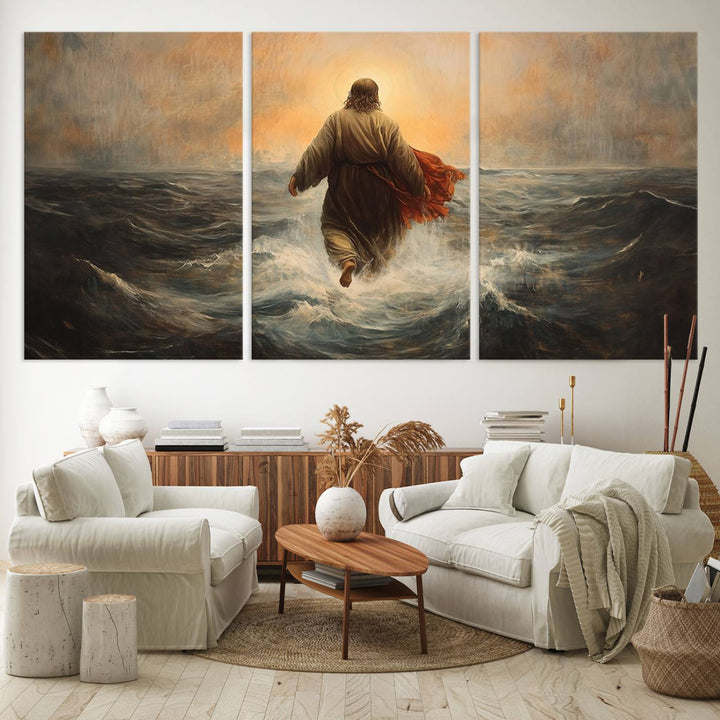 A modern living room is adorned with a triptych titled "Jesus Walking on Water, Christian Wall Art, Jesus Christ Walking on Oil Painting Style Print." The artwork, presented on museum-quality canvas, showcases vibrant colors and exquisite detail.