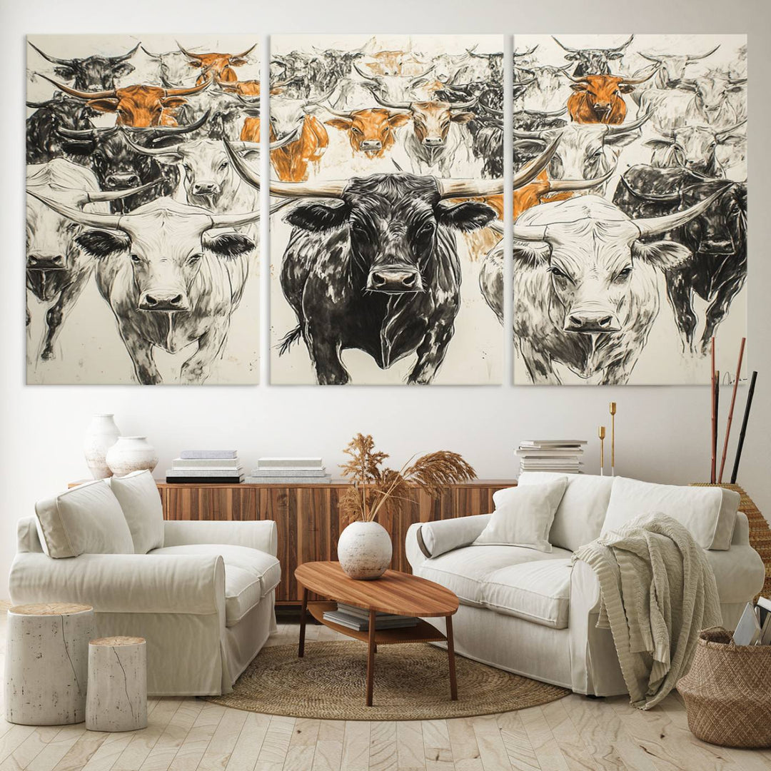 This exquisite farmhouse wall art, titled "Western Longhorn Cattle Canvas Print," showcases a majestic herd of longhorn cattle in a three-panel design. This ready-to-hang and framed barn decor infuses your space with rustic charm.