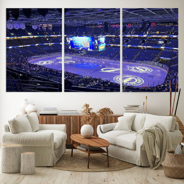 The wall art canvas print at Amalie Arena features team logos on ice, encapsulating the vibrant atmosphere of an NHL hockey stadium.