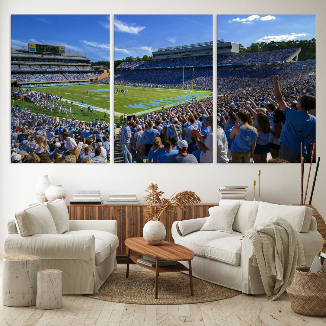 A gallery-quality canvas wall art print featuring the University of North Carolina Tar Heels Football Team and Chapel Hill's Kenan Memorial Stadium adorns the cafe wall.