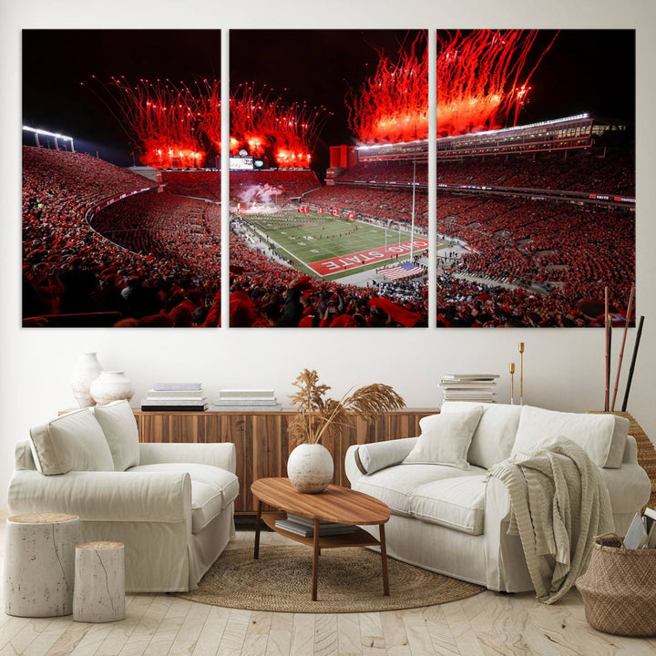 A vibrant red canvas art of a packed Ohio State Buckeyes stadium at night with fireworks.