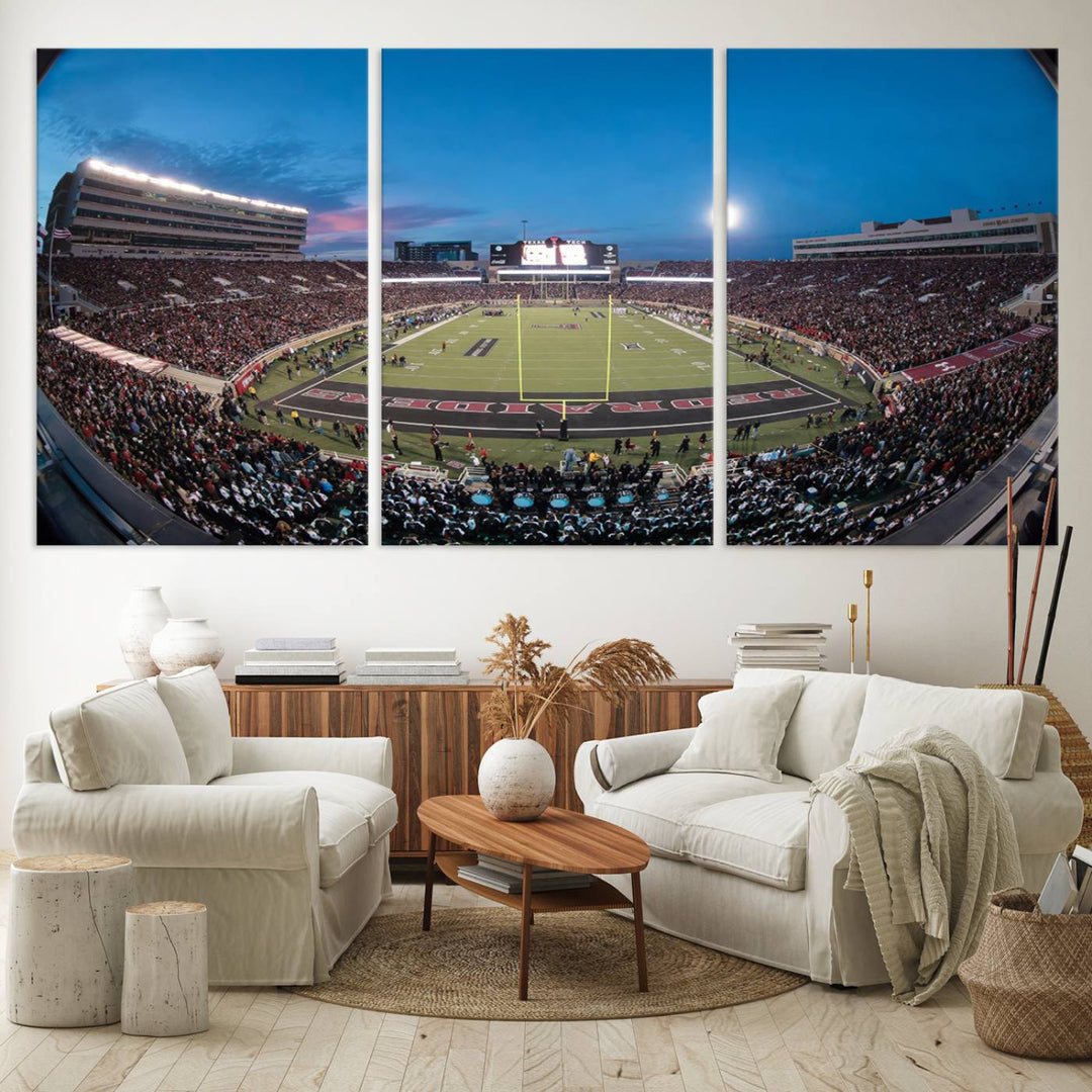 The wall art in the living room features a Texas Tech Red Raiders Football Team Print, showcasing Jones AT&T Stadium at dusk.