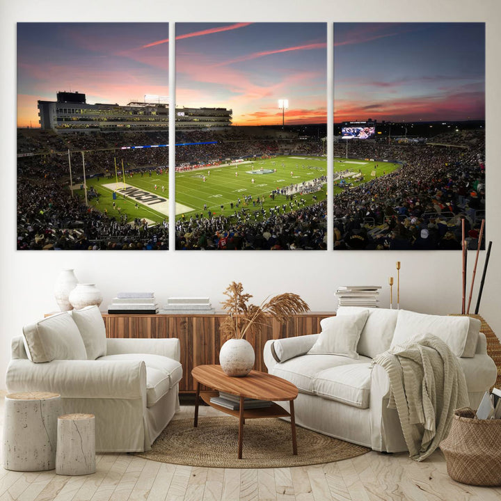 This wall art canvas print captures UCONN Huskies fans energizing a sunset scene at East Hartfords Pratt & Whitney Stadium.