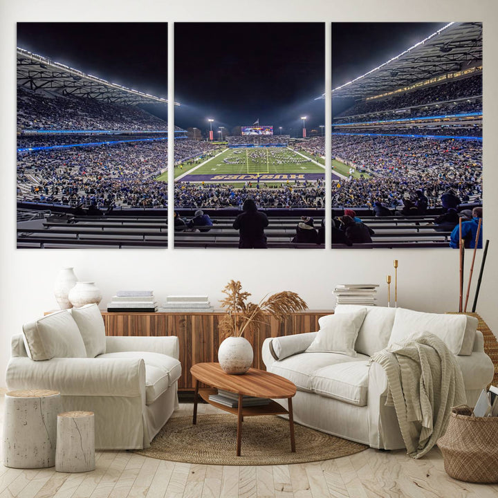 A canvas print titled The University of Washington Huskies Football depicts a packed Husky Stadium at night, as seen from the stands.