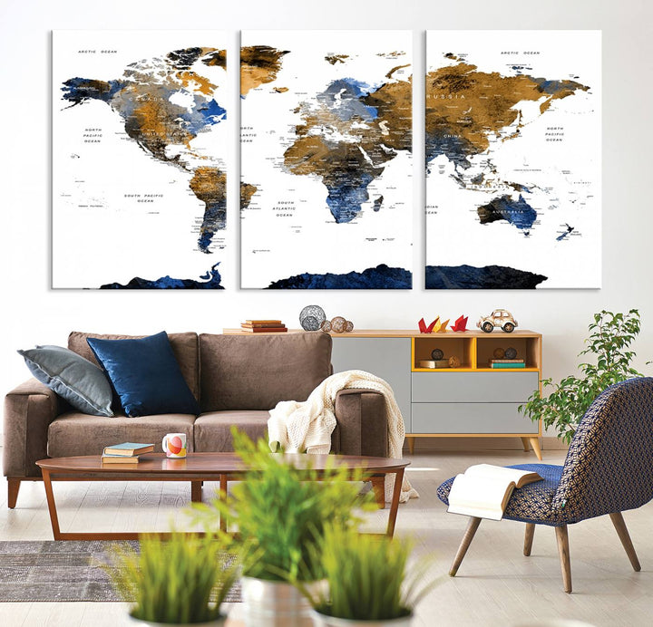 The Watercolor World Map Canvas showcases a grunge-stained background in gold, gray, and blue hues.