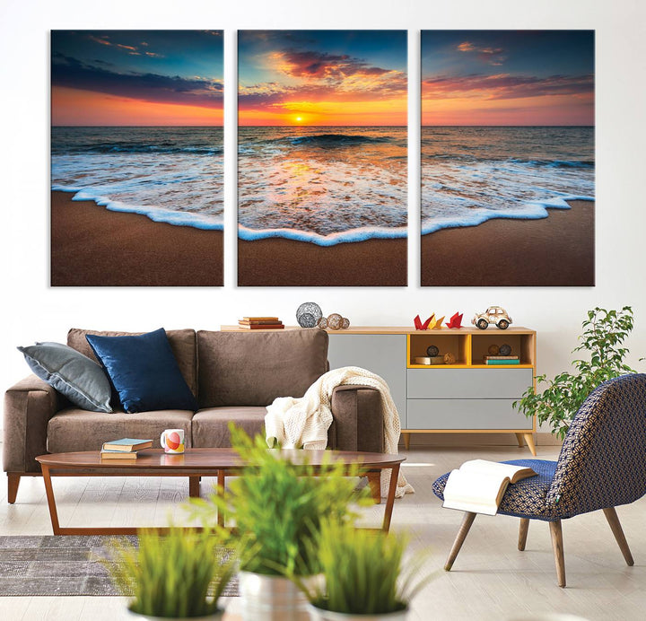 A Sunset with Calm Waves on the Beach Wall Art Canvas Print adorns the dining room.