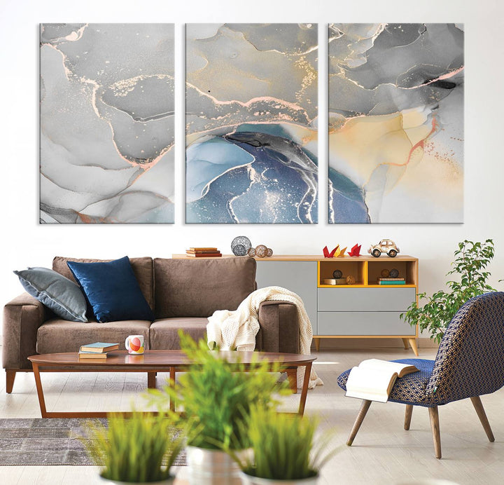 Gray Marble Fluid Effect Abstract Canvas with swirls of gray, gold, and blue.