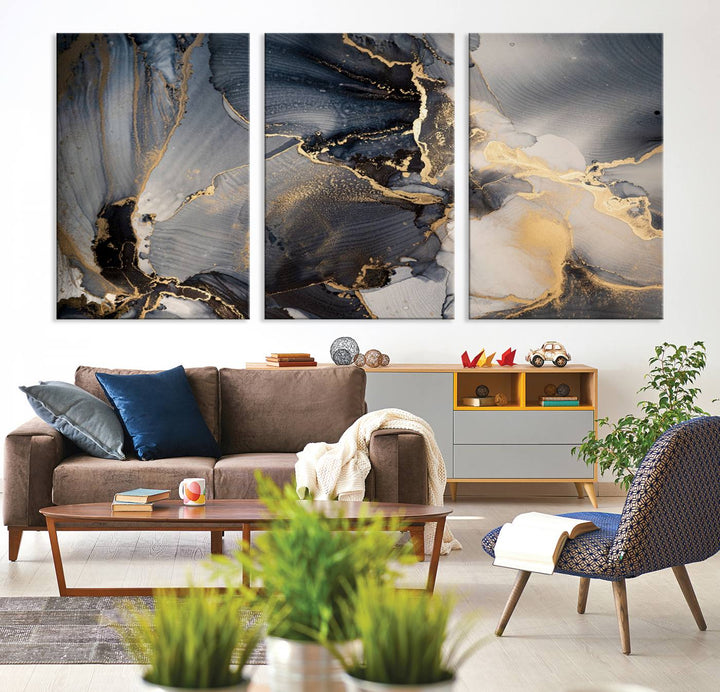 A Modern Marble Fluid Effect Abstract Wall Art with black, white, and gold swirls hangs in a modern kitchen.