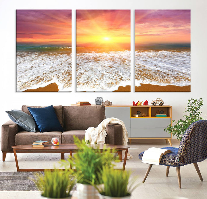 Golden Beach Sunrise 3-panel canvas art of ocean waves, hung on a wooden wall.