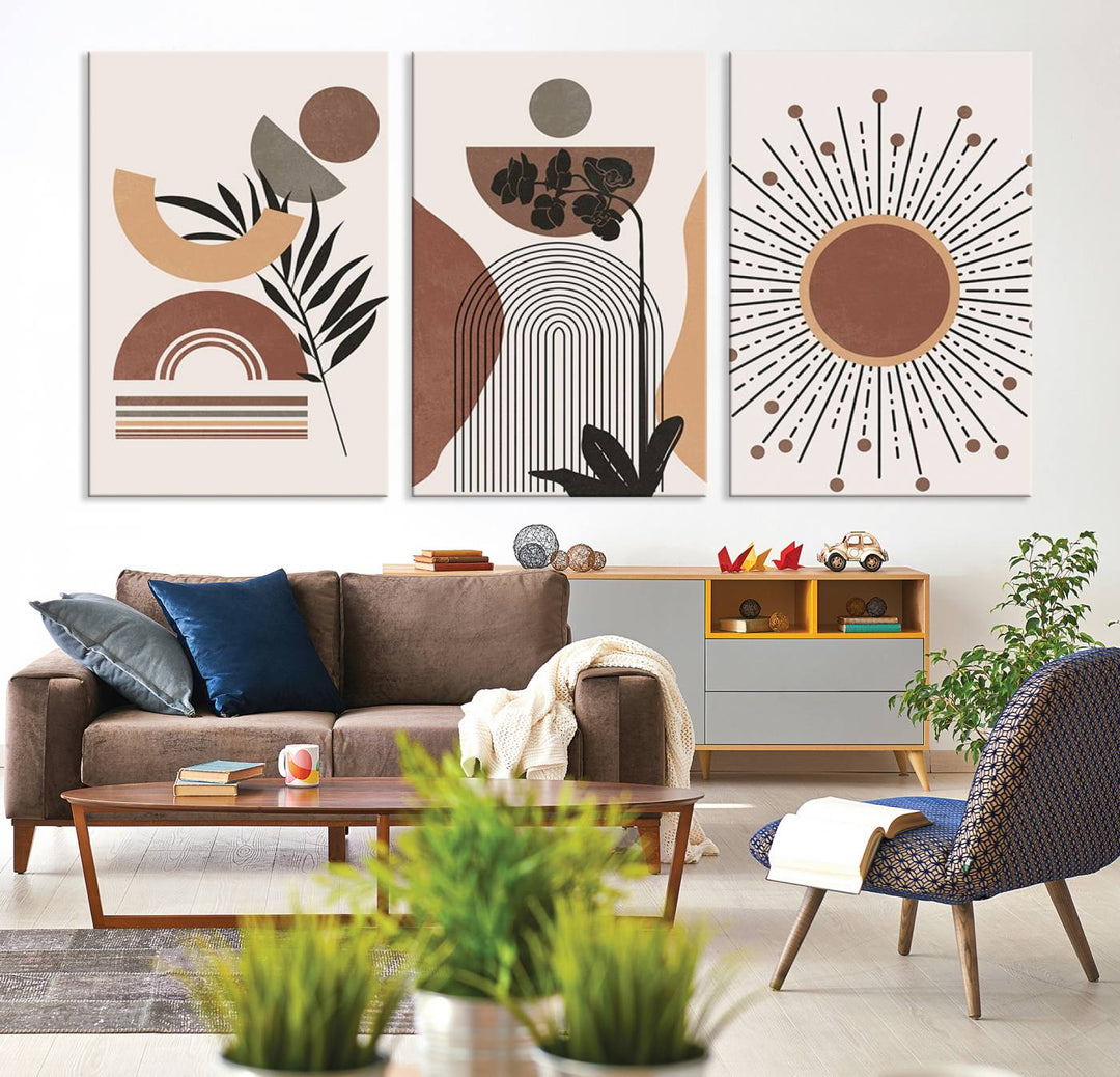 A trio of Boho Wall Art Canvas Print Sets, showcasing mid-century and bohemian styles on museum-quality canvas, adorn the wall.