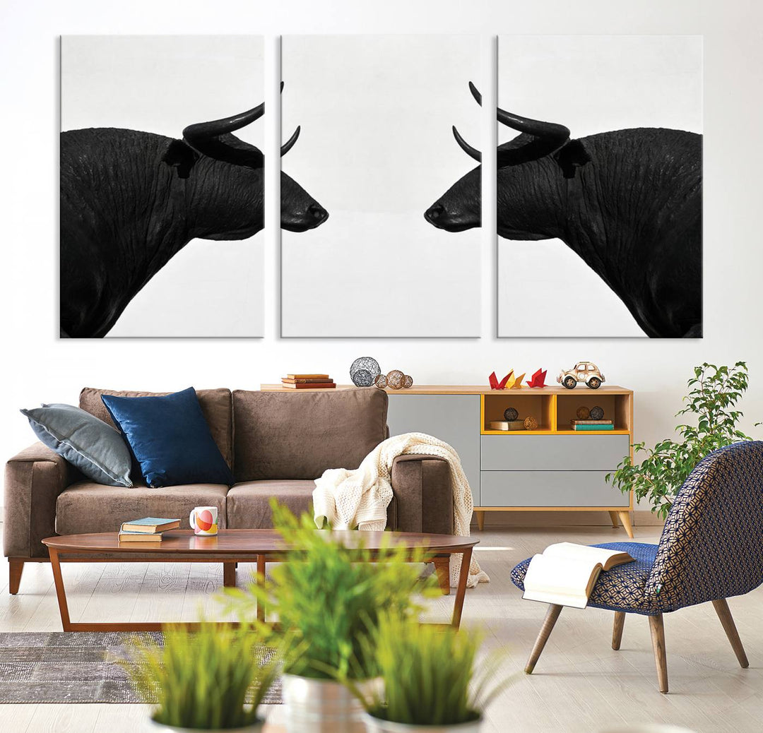 Spanish Bull Wall Art Canvas Print: Two black bull heads facing off on museum-quality canvas.