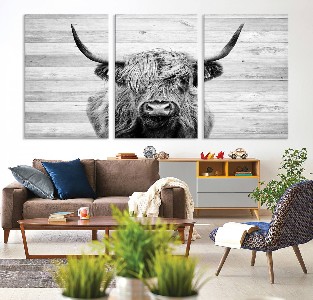 Scottish Highland Cow Cattle Art adds rustic farmhouse charm to the space.