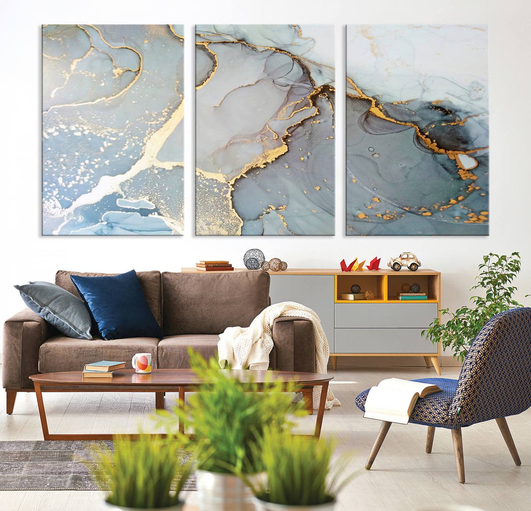 A blue and gold marbled Large Abstract Marble Wall Art Canvas Print hangs overhead.