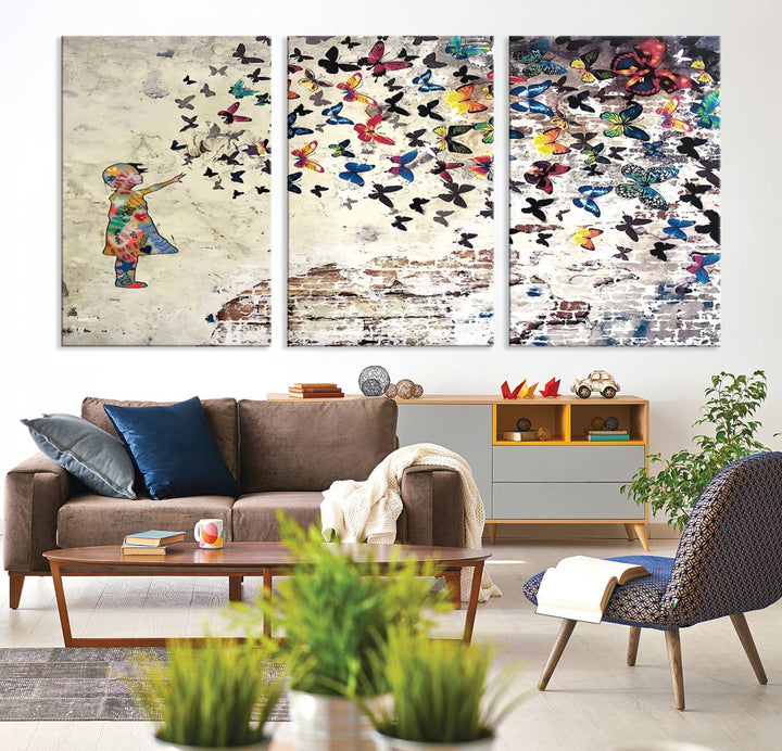 A Banksy Girl Butterfly Canvas Print is displayed on the textured wall.