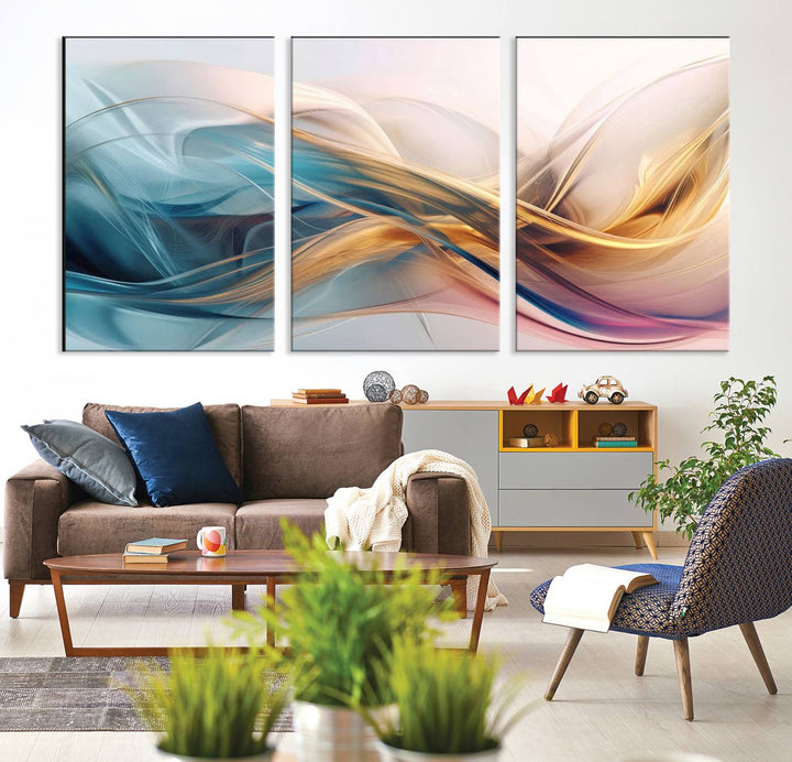 Abstract Flowing Colors Wall Art featuring blue, gold, and pink adds modern elegance to the space.