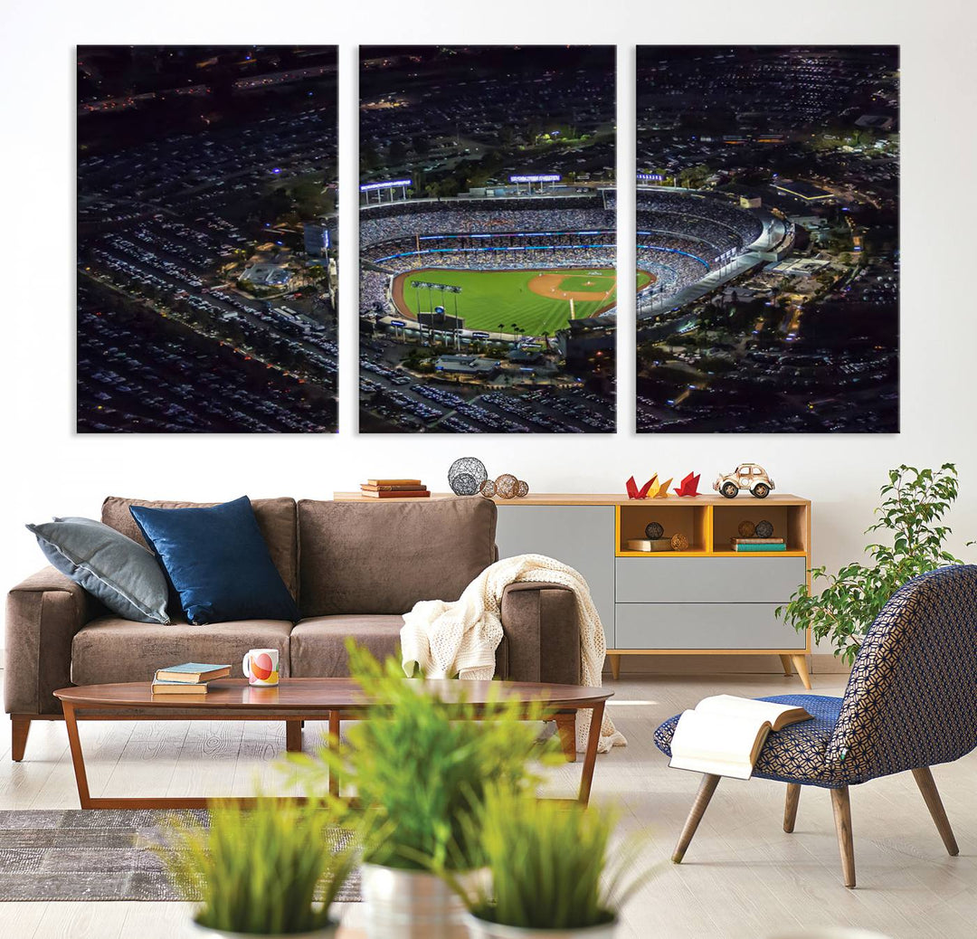 A large Los Angeles Dodgers print of Dodger Stadium at night is displayed near a window.