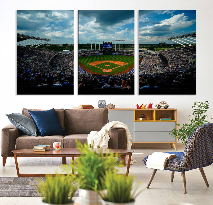 A 3-panel print of Kauffman Stadium, showcasing a crowded baseball field under cloudy skies.