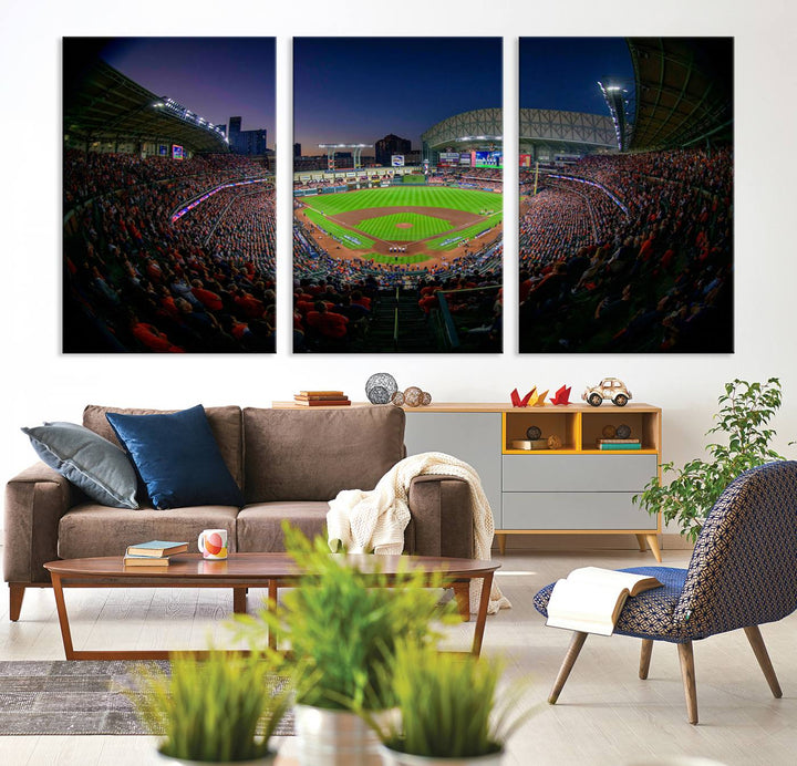 A canvas print of Houston Minute Maid Park at dusk is mounted on the wall.