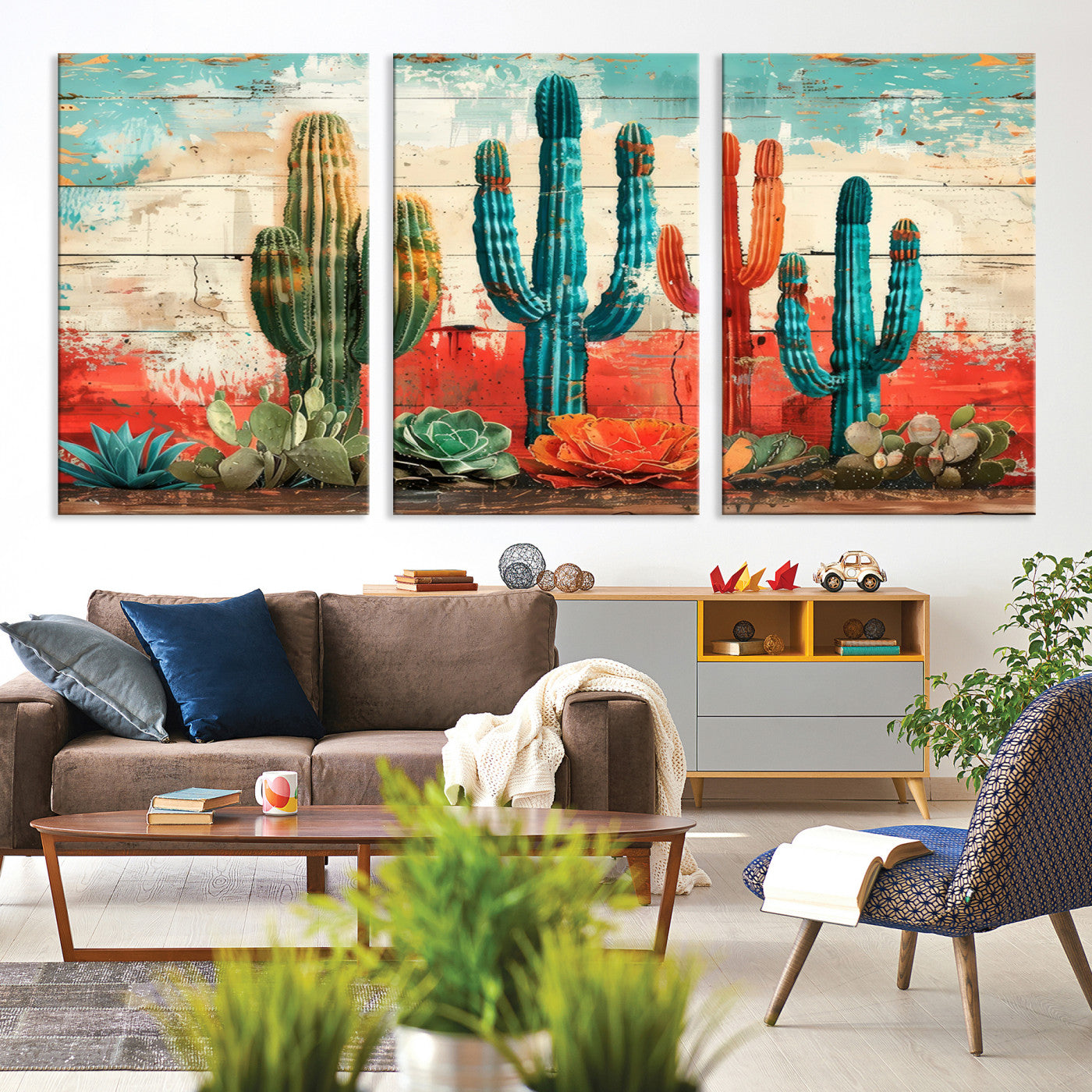 A vivid southwestern-style artwork featuring an eclectic mix of cacti and succulents painted against a textured, rustic wood backdrop in rich turquoise, red, and orange hues.