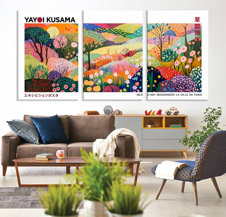 Three vibrant, abstract Yayoi Kusama wall art prints adorn a black wall, creating a perfect blend of contemporary décor.