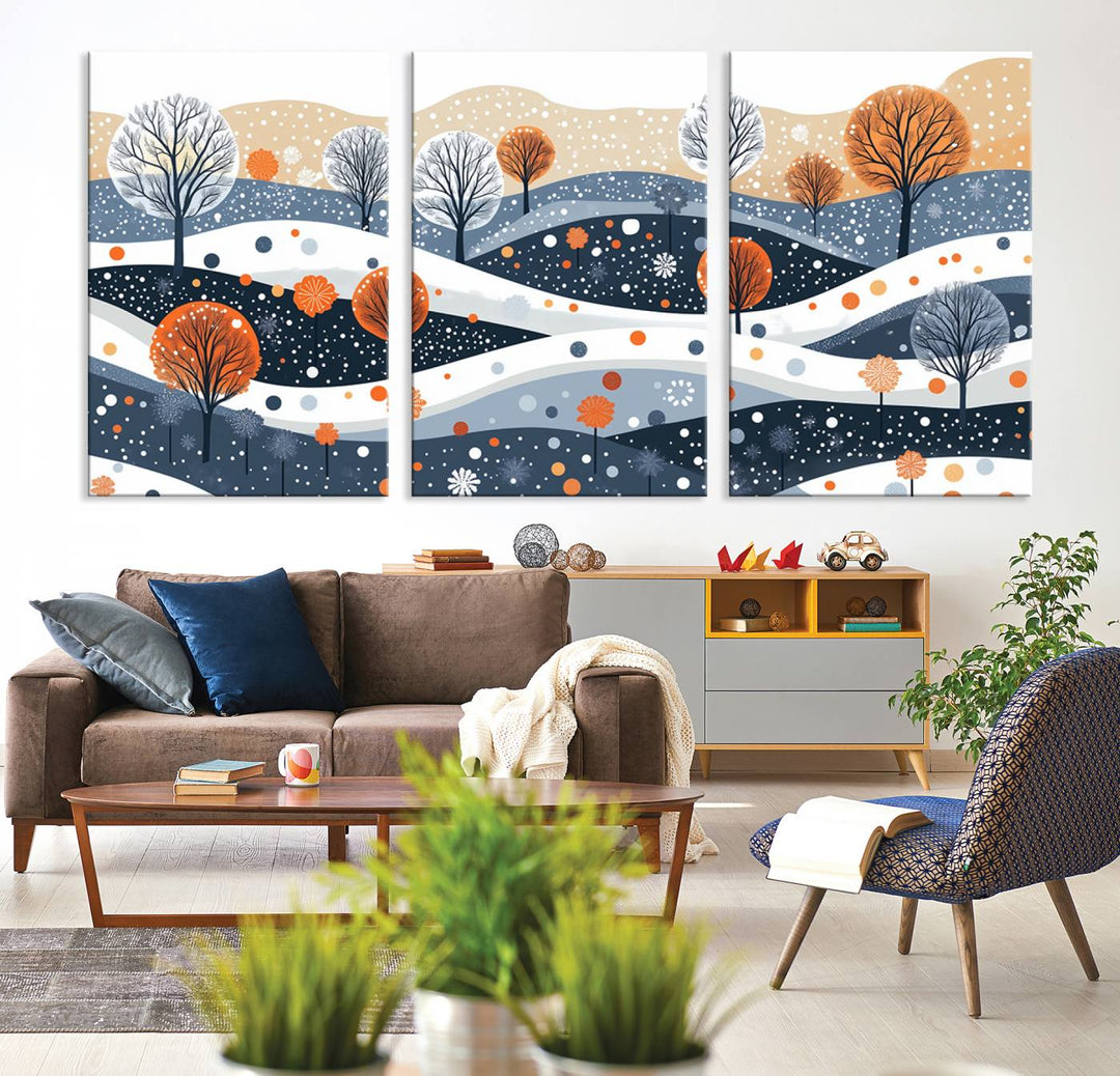 The "Abstract Winter Landscape Canvas Wall Art Print," featuring a triptych of landscapes with trees and hills in vibrant orange, white, and blue hues, adds a gallery-quality finish that transforms the space into an art lover's dream.