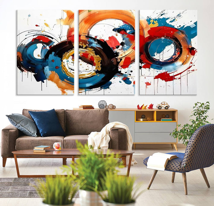 The Abstract Wall Art Rings Canvas Print, with its bold and colorful circular strokes, adorns the wall, epitomizing contemporary design.