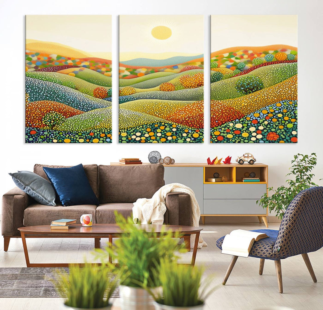 The YAYOI KUSAMA Colorful Dot Art Landscape Canvas, a framed abstract pointillism piece inspired by nature featuring vibrant rolling hills and a sun, adds gallery-quality elegance to your living space.