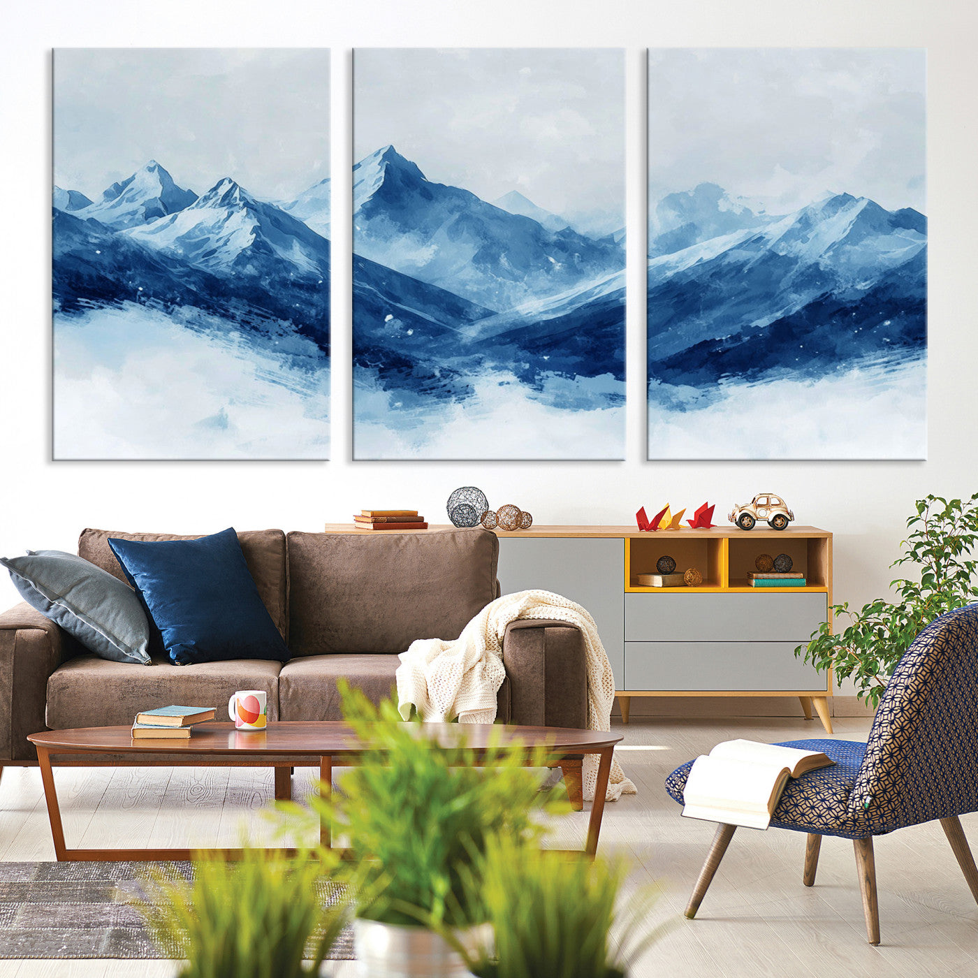 Peaceful watercolor-style painting of snowy blue mountains in soft tones, perfect for winter-themed or minimalist wall decor.