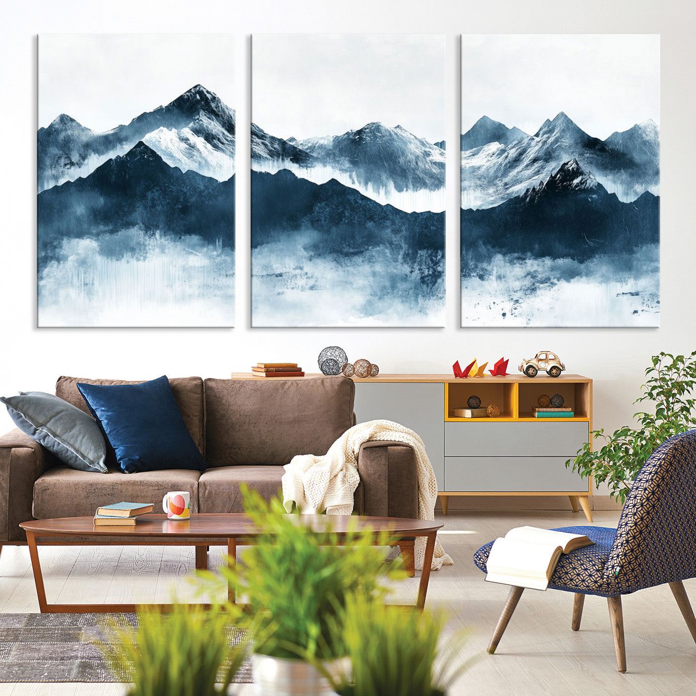 Abstract blue-toned canvas of snowy mountains in misty tones, ideal for minimalist or moody alpine-inspired home decor.