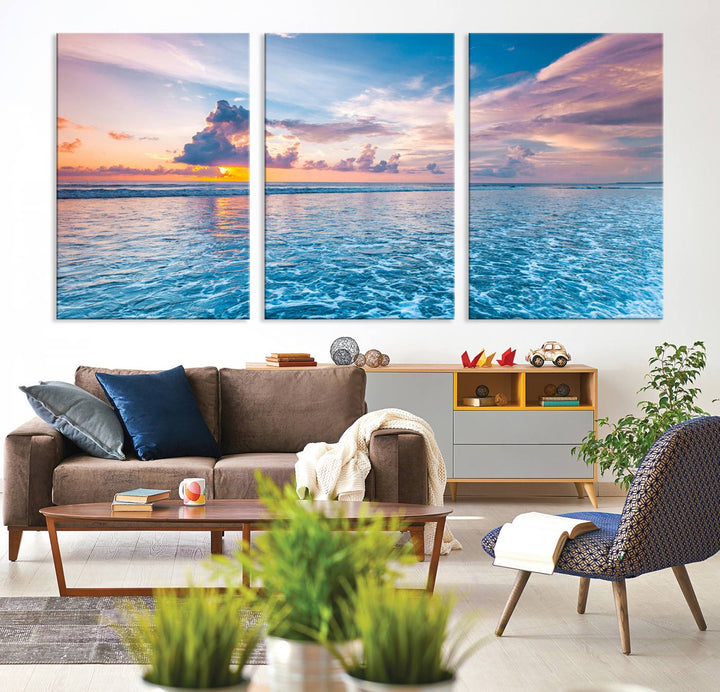 An Ocean Sunset Canvas Wall Art depicting a vibrant sky and rolling waves.