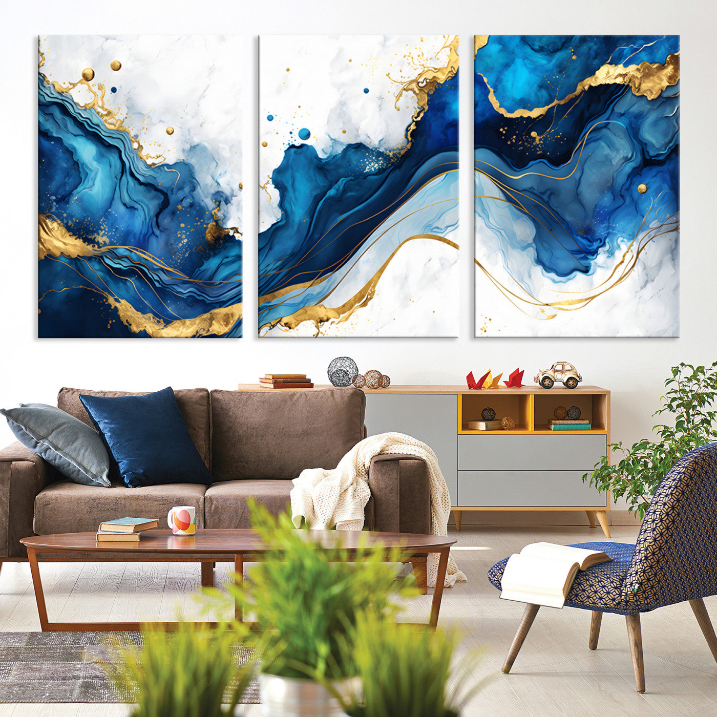 Elegant abstract canvas in cobalt blue and gold tones, featuring marble waves and fluid motion, ideal for luxe interior styling.