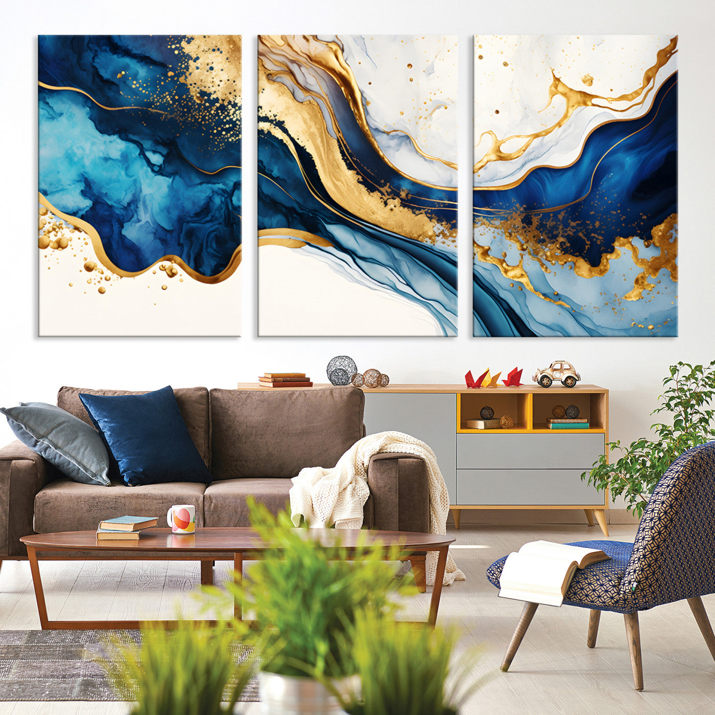 Canvas artwork with fluid blue and gold marbling, perfect for modern luxe or elegant abstract home decor styles.
