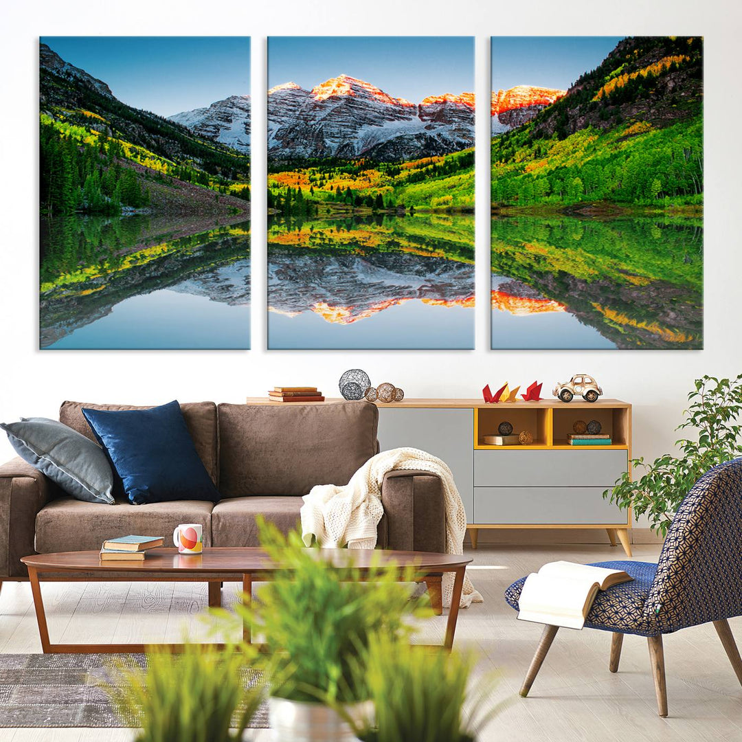 The Sunrise Maroon Bells Lake Wall Art Print beautifully captures North Maroon Peak mirrored in the tranquil lake, framed by lush greenery.