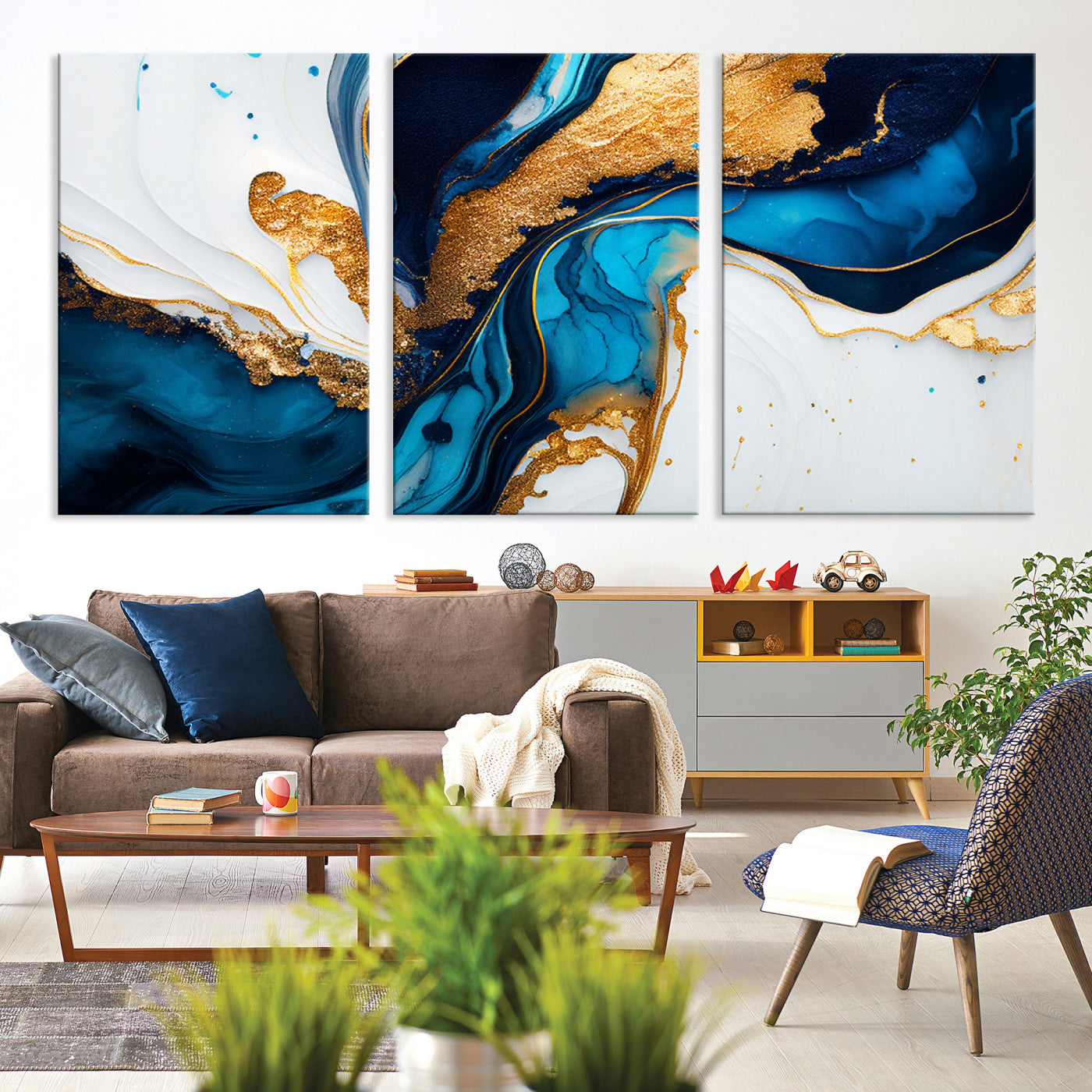Luxurious abstract canvas in gold, navy, and teal tones with fluid marble patterns, perfect for modern glam or upscale interiors.