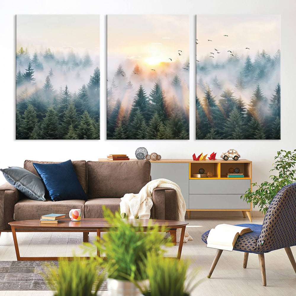 Misty Pine Forest Wall Art: A depiction of sunrise over foggy trees and birds against a bright sky; a framed woodland scene ideal for home or office decor.